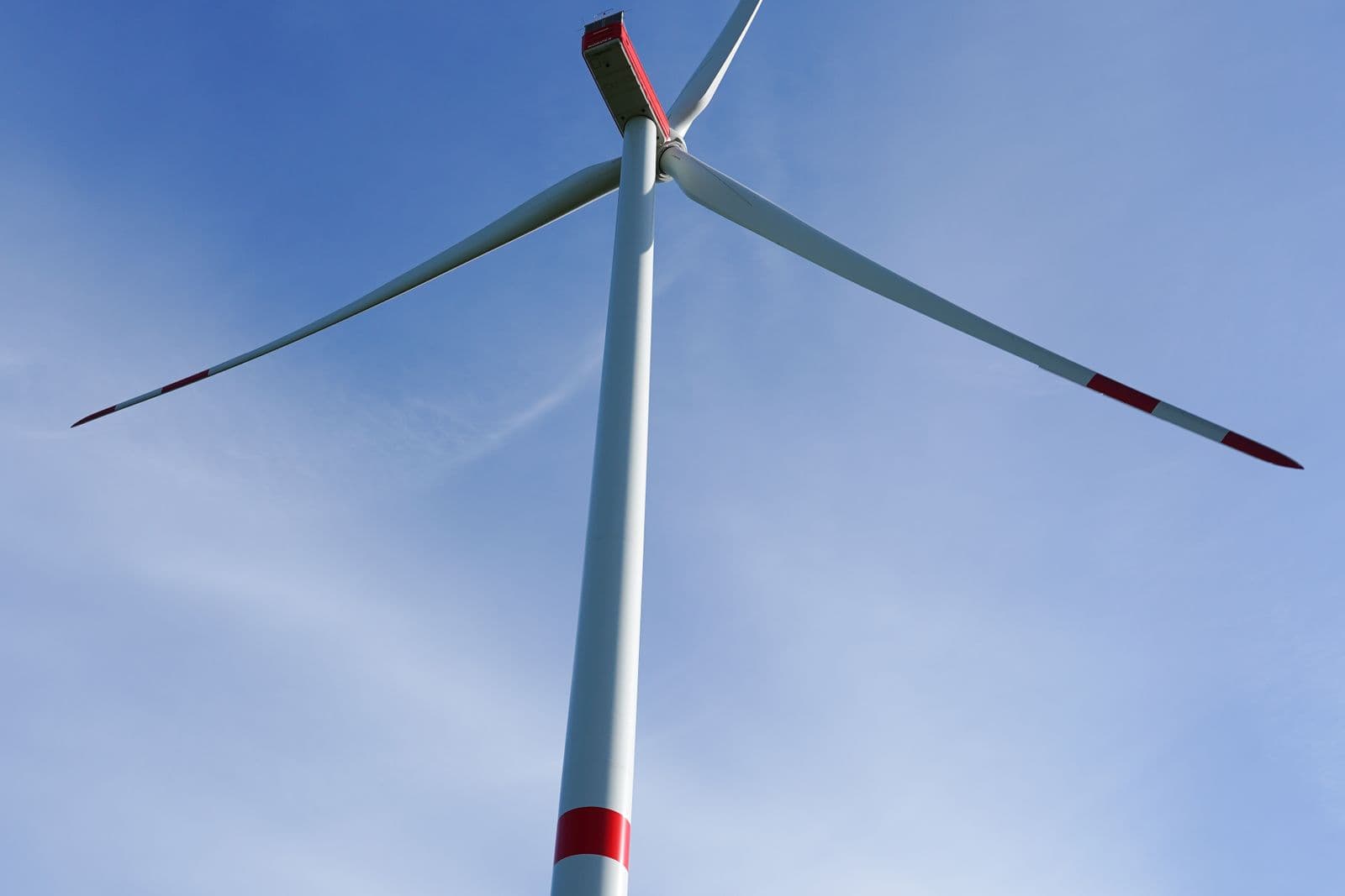 Wind turbines against an open sky